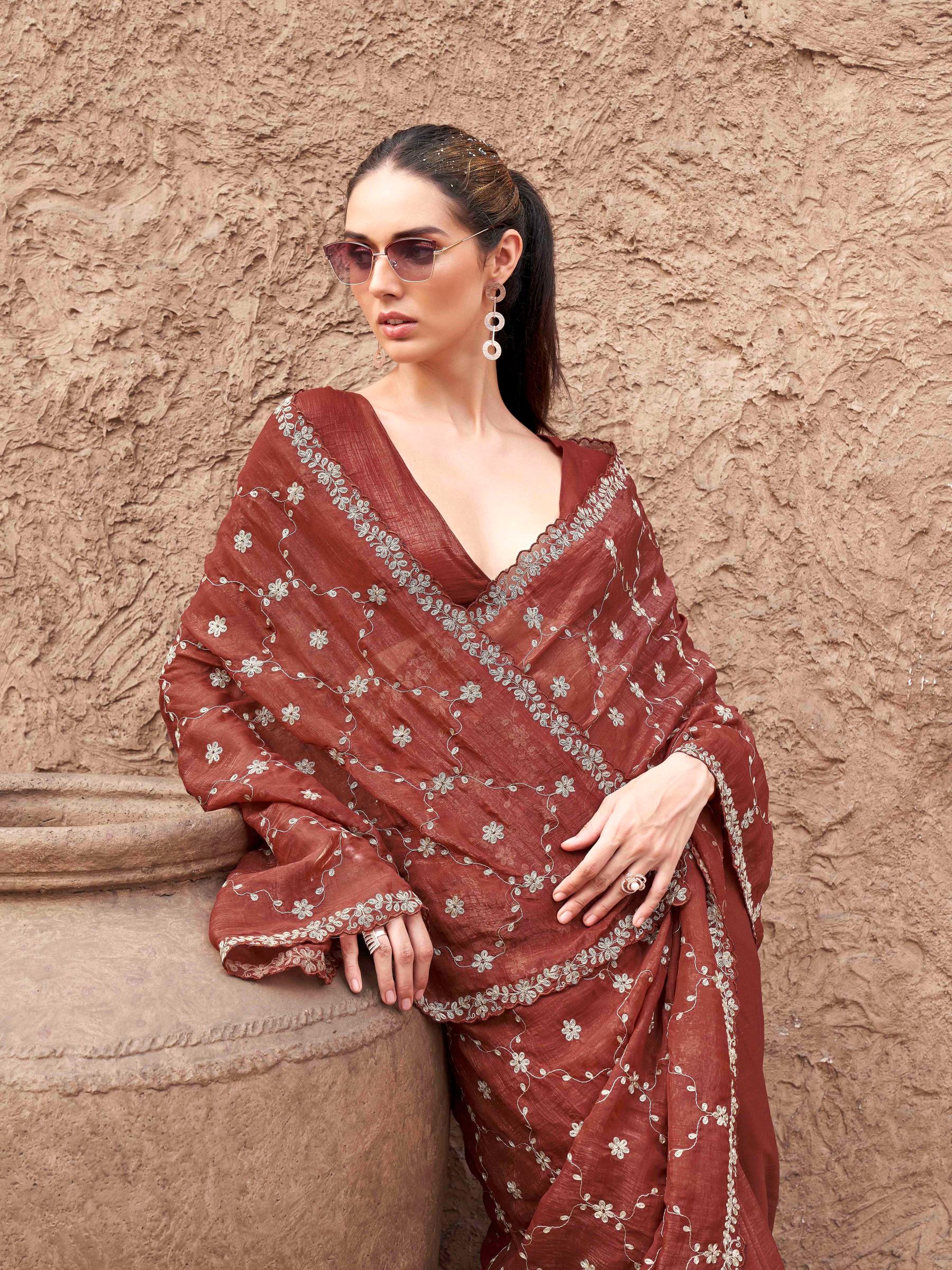 Rust colored crunchy saree with pitha embroidered work